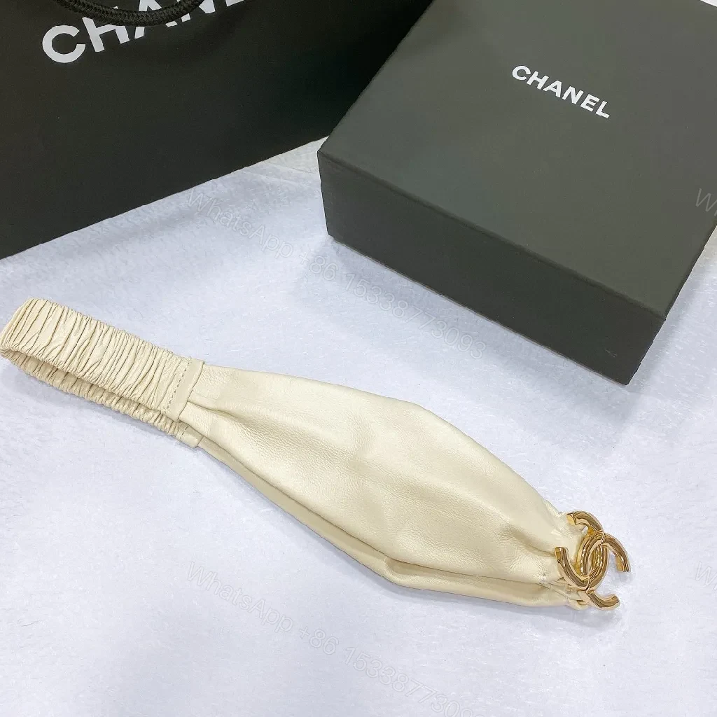 View 4 of Ivory Faux Leather Headband with Gold Logo Emblem - Chic, Everyday Glam