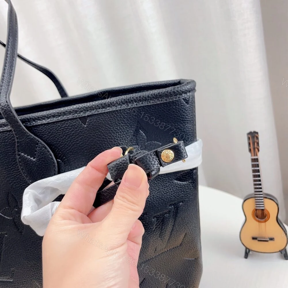 View 8 of Louis Vuitton Neverfull MM Monogram Empreinte Black 31Cm M45685
