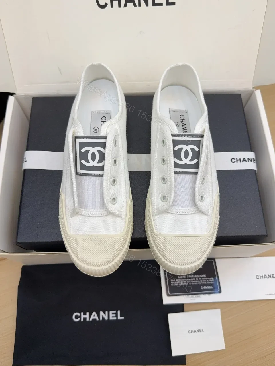 View 2 of Refined Canvas Sneaker: Luxe Logo-Front High-Top Comfort