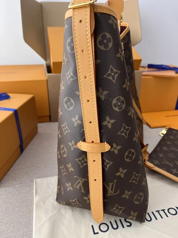 View 4 of Iconic Monogram Tote: LV Canvas, Leather Trim, Everyday Luxury