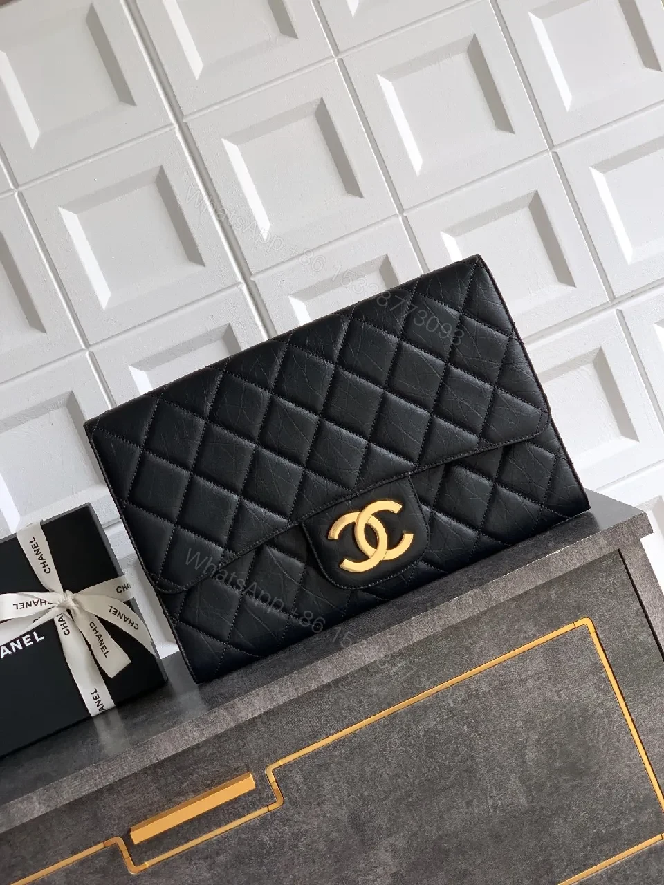Quilted Black Clutch with Gold-Accent Hardware Luxury Compact — view 1