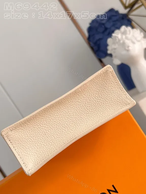 View 5 of Blue Monogram Calfskin Mini Top-Handle Bag - LV Chic Luxury