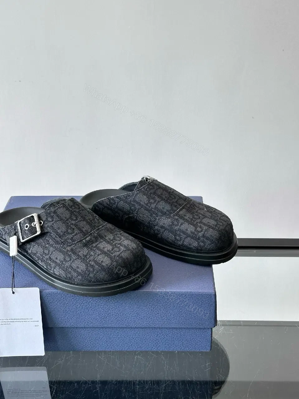 View 2 of Dark Monogram Slip-Ons: Textured Mules with Subtle Buckle