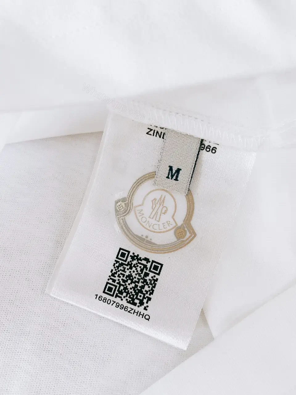 View 8 of White Cotton Crewneck Tee – Graphic Crest, Modern Luxe, Everyday Essential