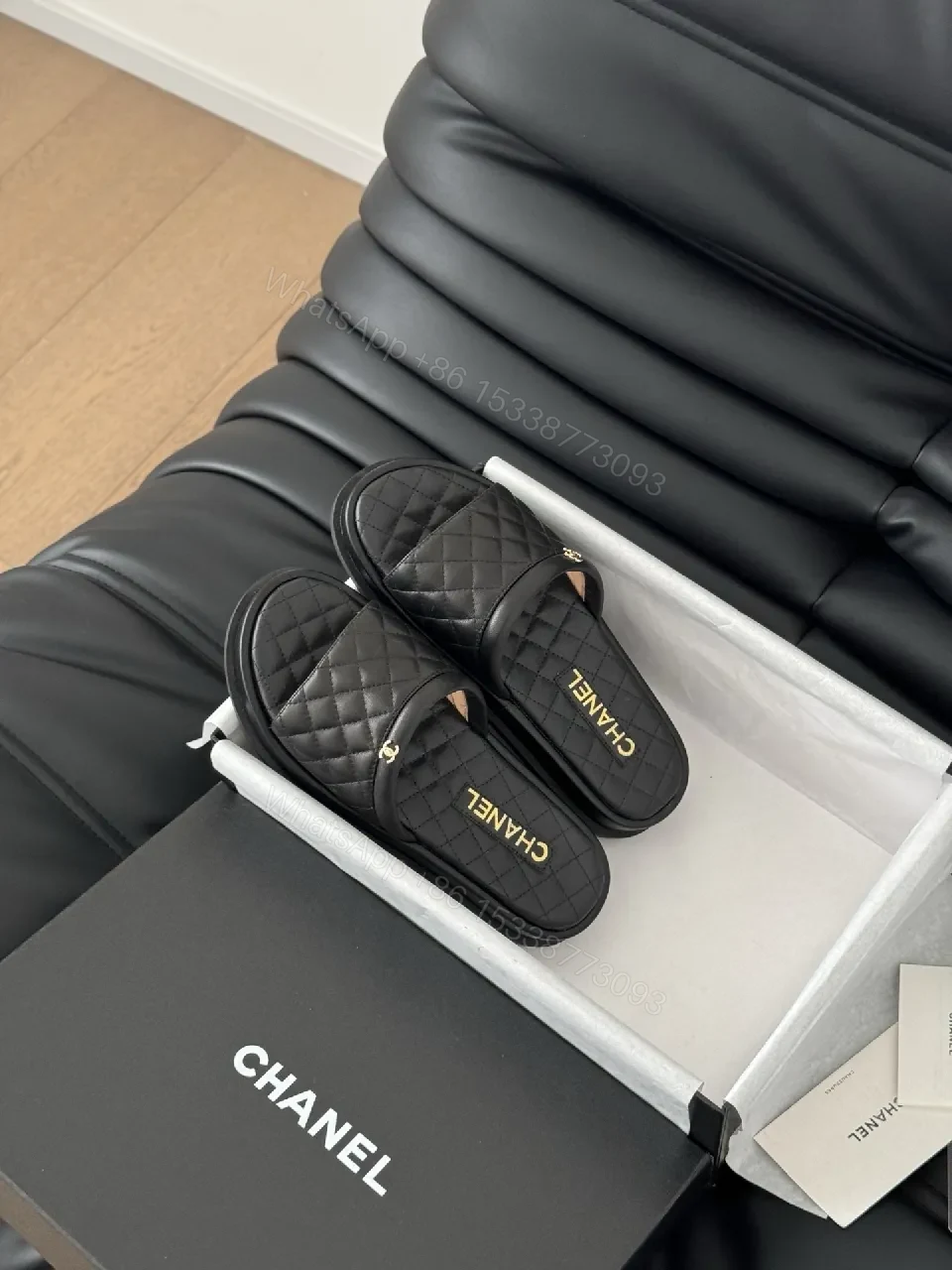 View 9 of Quilted Black Slip-Ons with Gold Logo - Luxe Comfort Shoes