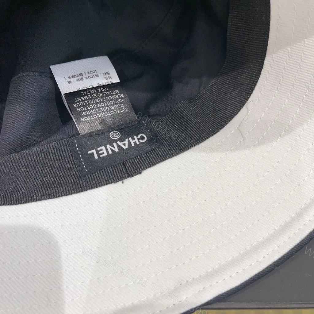 View 3 of White Cotton Bucket Hat - Luxe Minimalist, Subtle Logo