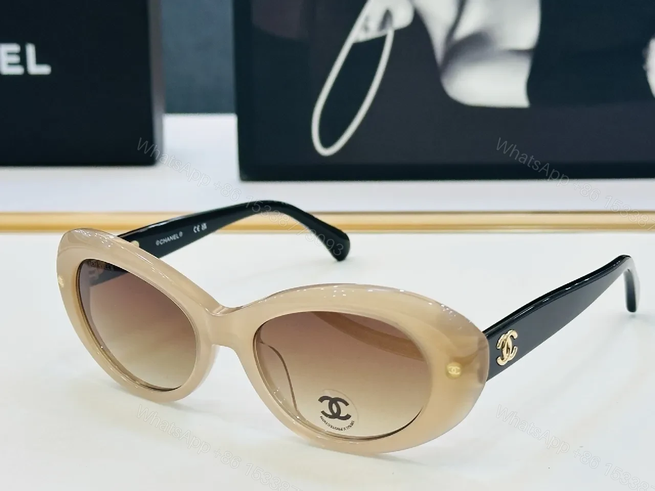 View 4 of Chic Black Cat-Eye Sunglasses with Gold Detailing