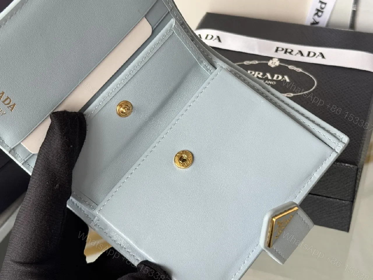 View 5 of Blue Saffiano-Like Bifold Wallet with Triangle Closure, Minimal Luxury
