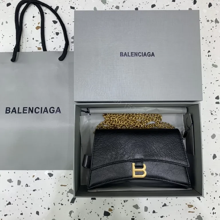 Chic Black Leather Mini Bag with Gold B Clasp â€“ Compact Luxury — view 1