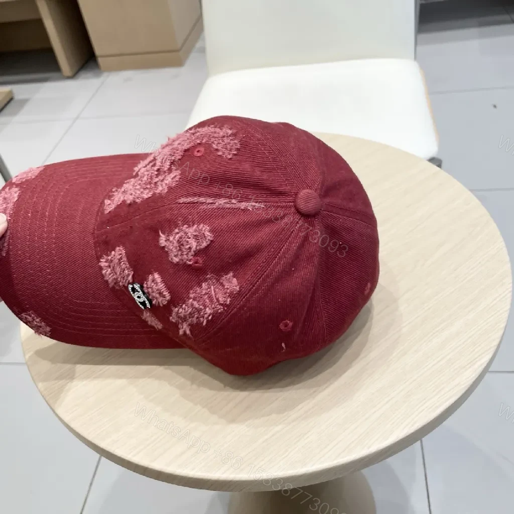 View 5 of Distressed Burgundy Cap: Luxe Texture, Subtle Logo, Everyday Wear