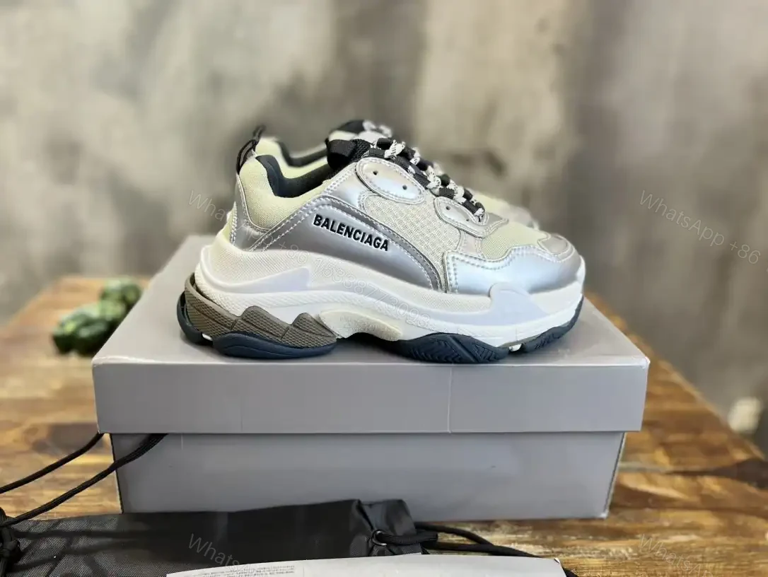 View 2 of BALENCIAGA WOMEN’S TRIPLE S SNEAKER IN BLACK/WHITE/SILVER – BB256