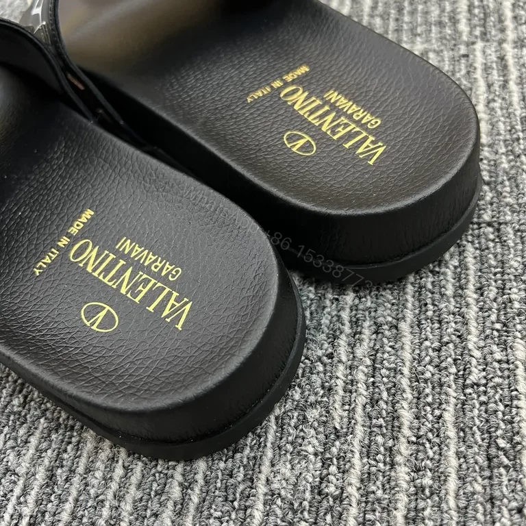 View 3 of Valentino Rockstud Leather Slides â€“ Black, Cushioned comfort