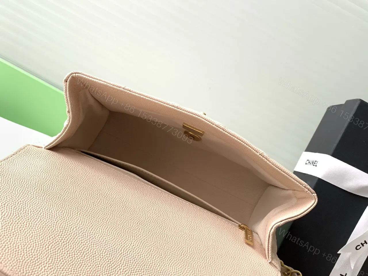 View 8 of Soft Beige Quilted Bag with Luxe Chain – Compact Luxury Tote