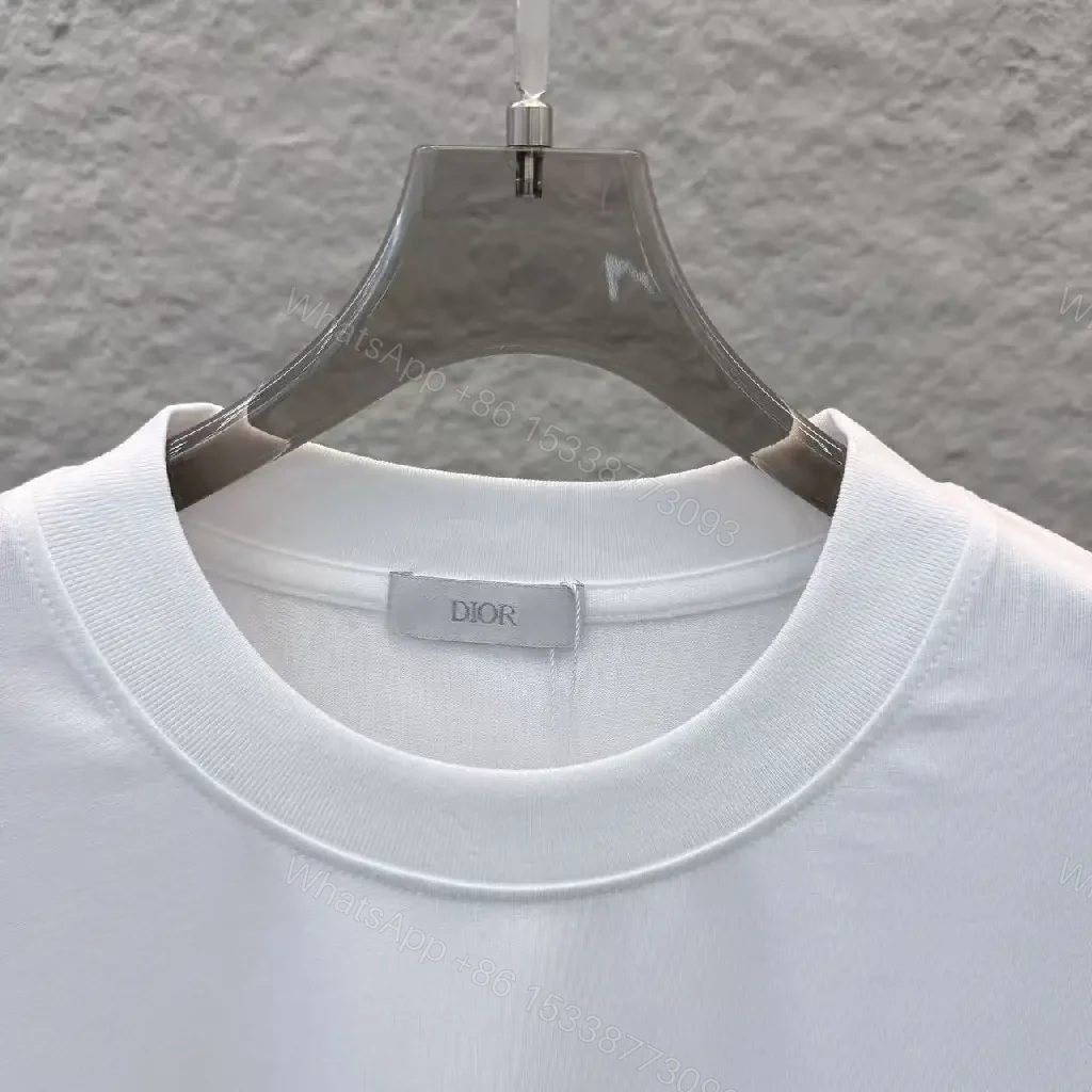 View 2 of Minimalist White Tee with Dior Script—Effortless Everyday Luxe