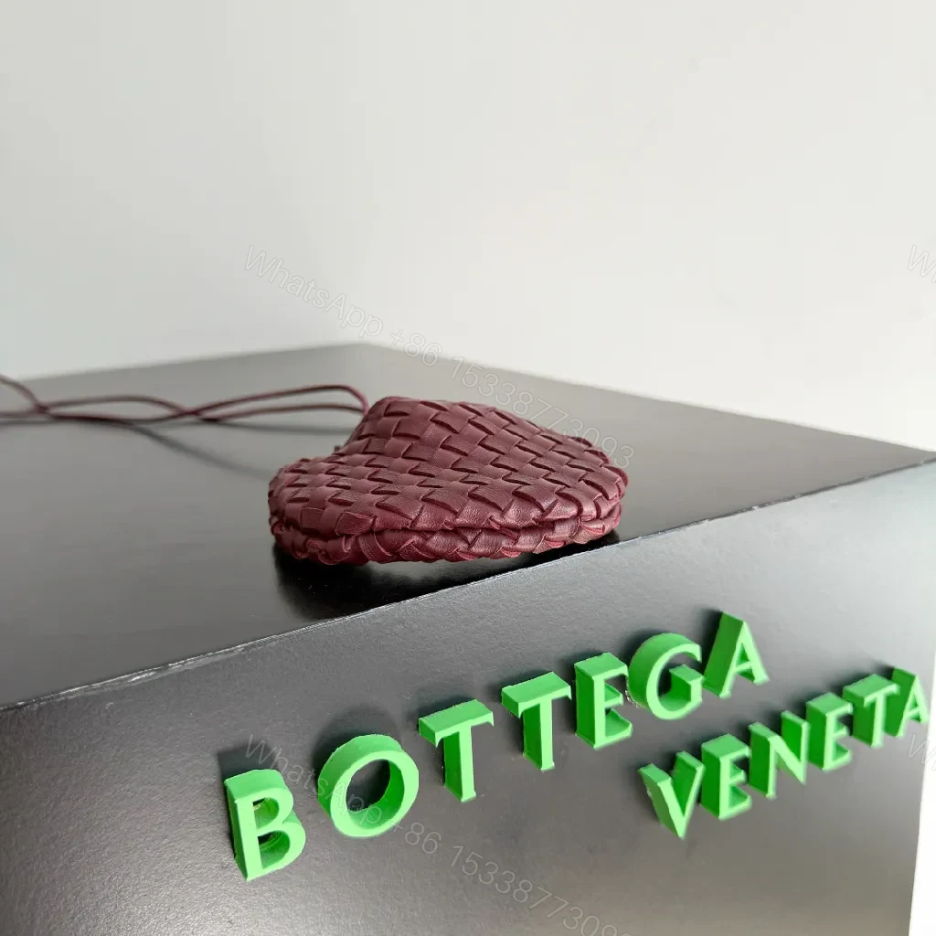 View 6 of Textured Plum Mini Bag: Handwoven Leather, Luxe Compact