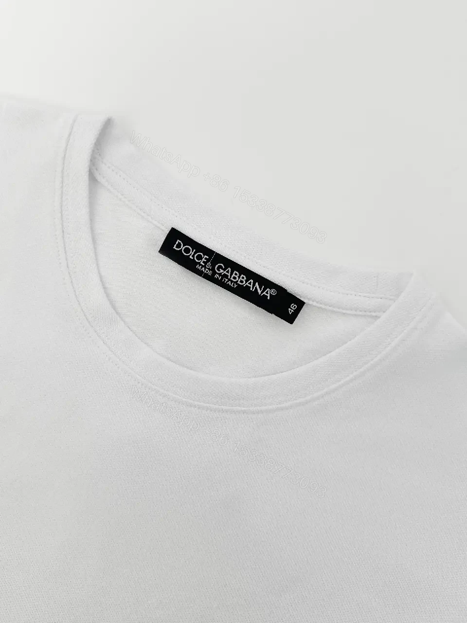 View 2 of Premium Cotton Tee: Minimalist White Crew Neck with Metallic Badge