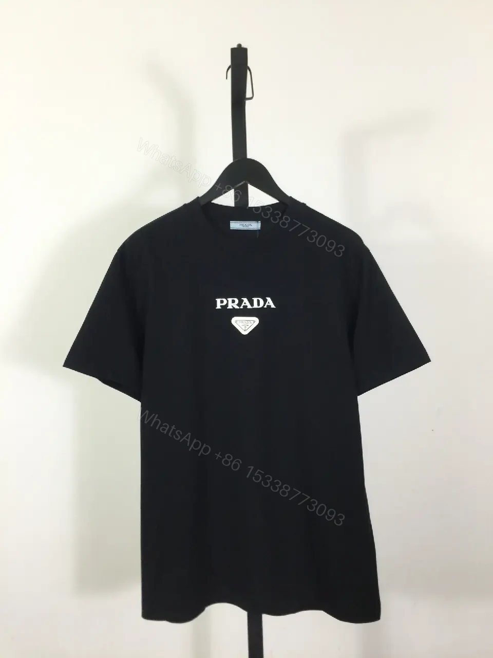 View 7 of Minimalist Black Logo Tee: Premium Cotton Blend, Relaxed Fit