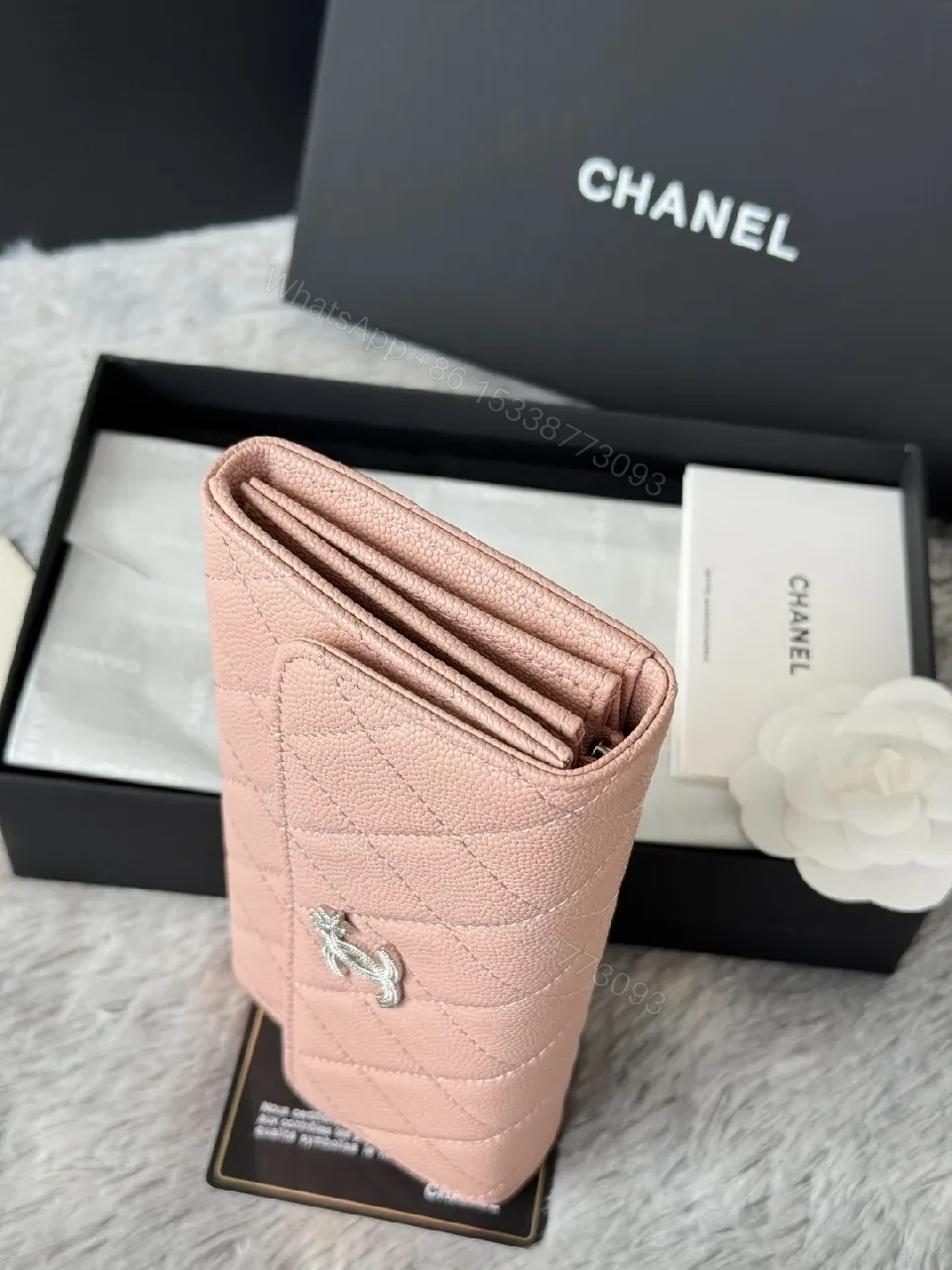 View 7 of Soft Pink Quilted Wallet with Silver Emblem - Compact Luxury Wallet