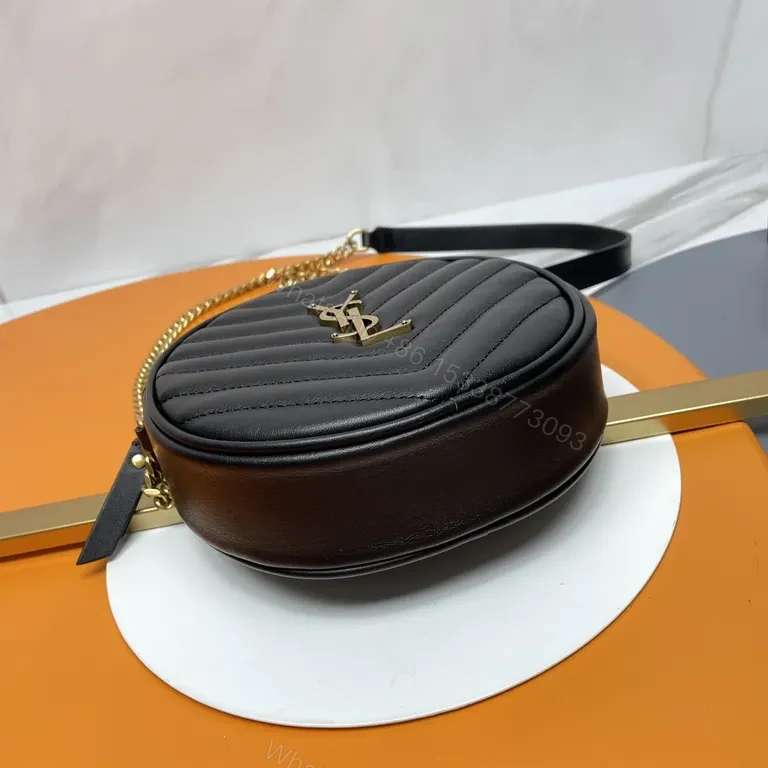View 4 of Chic Quilted Round Crossbody Bag â€“ YSL Accent, Luxe