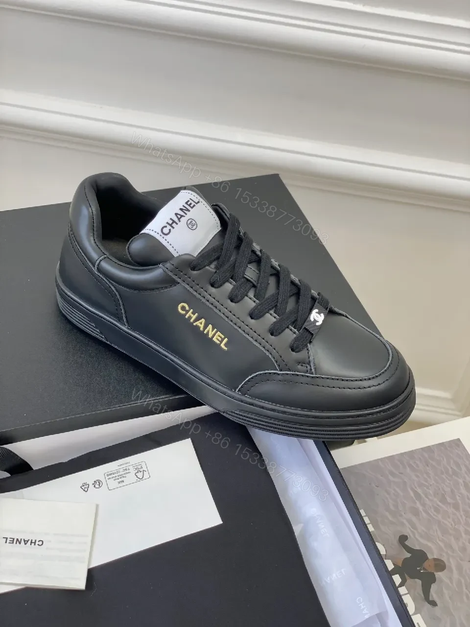 Black Leather Sneakers, Subtle Gold Accents, High-Top Style, Everyday Luxury — view 1