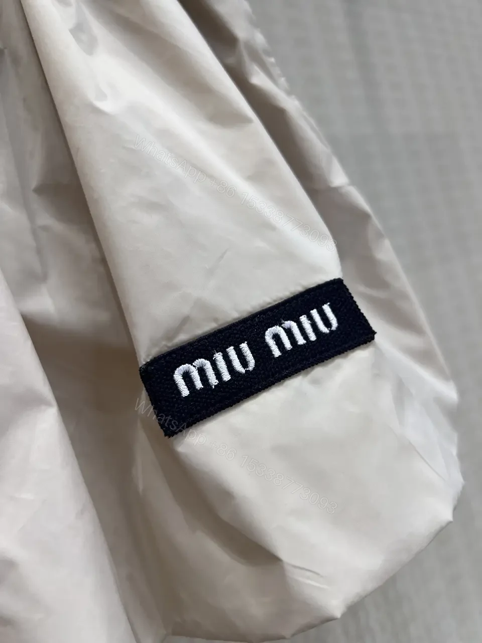 View 9 of Beige Nylon Short Skirt Drawstring Key Feature: Miu Miu Style