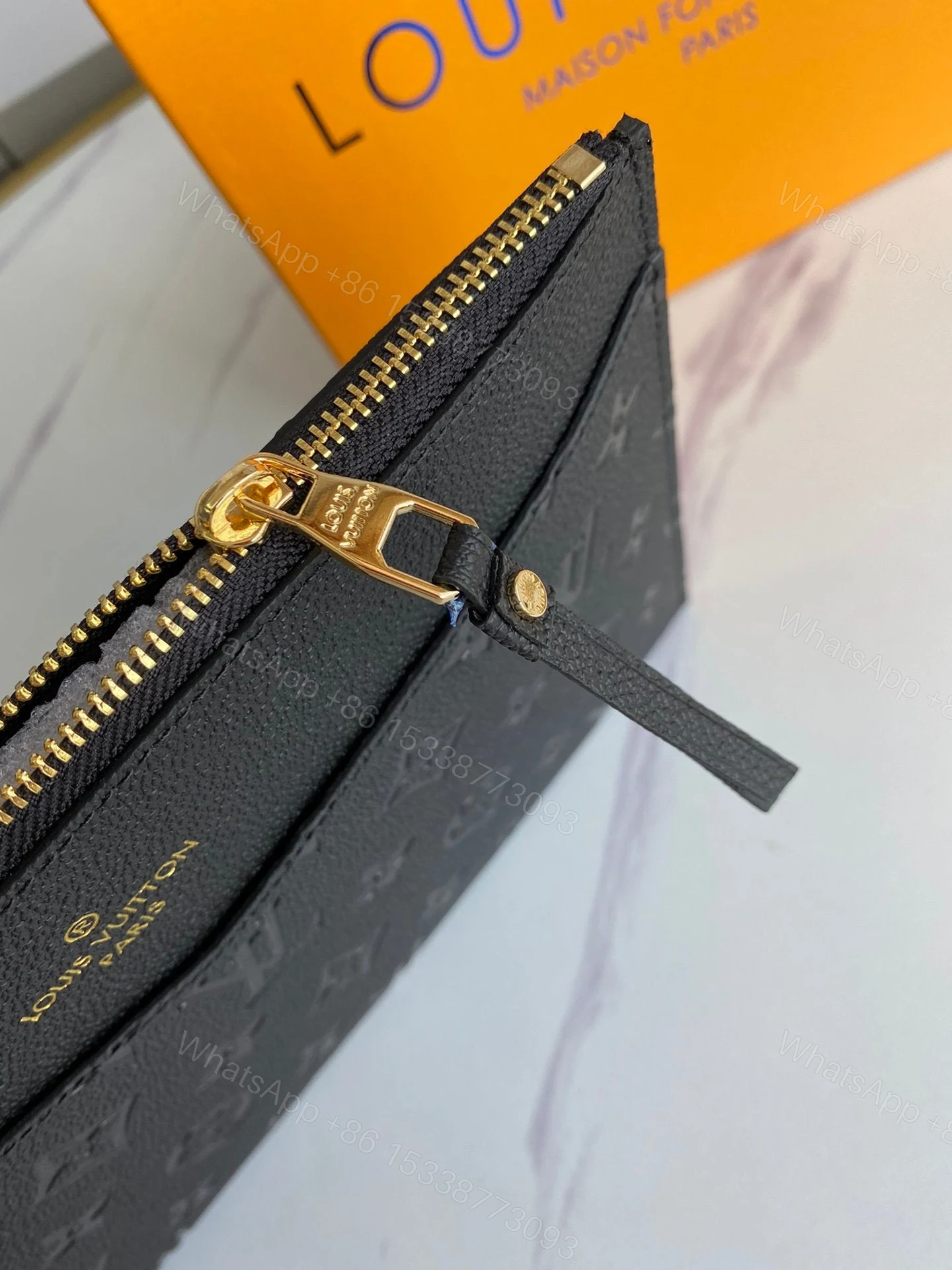 View 7 of Louis Vuitton Empreinte Daily Pouch Black