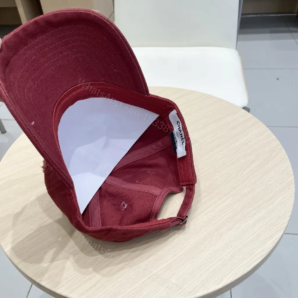 View 3 of Distressed Burgundy Cap: Luxe Texture, Subtle Logo, Everyday Wear