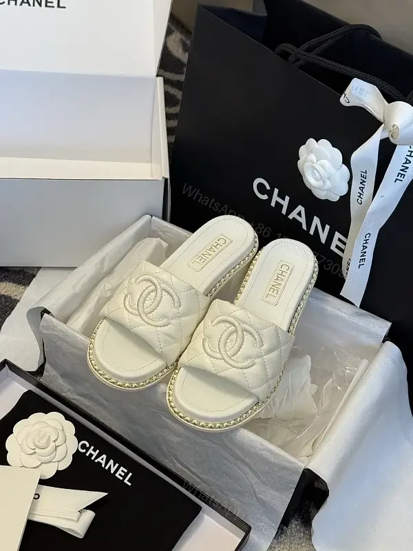 Quilted Slip-Ons: Luxury Comfort with Iconic Emblem — view 1