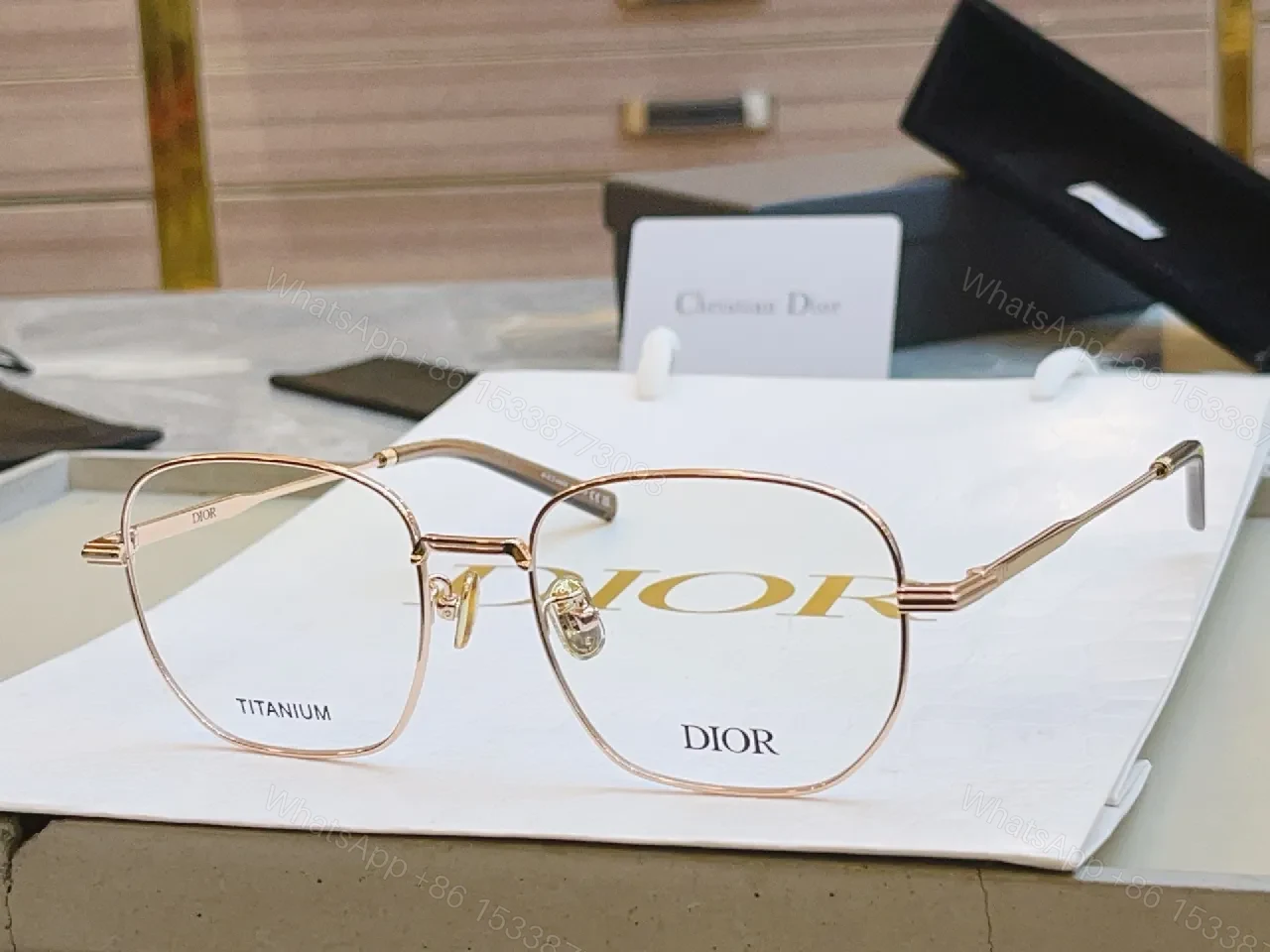 View 8 of Elegant Titanium Rim Eyewear: Subtle Designer Accents Suiting Any Look