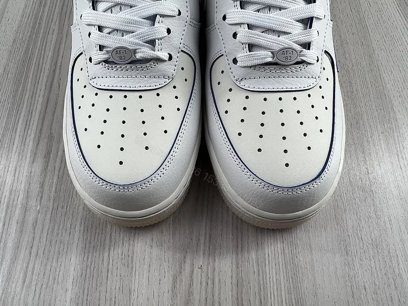 View 3 of White/Blue Premium Leather Air Force 1 Low - Minimal Luxe Sneakers