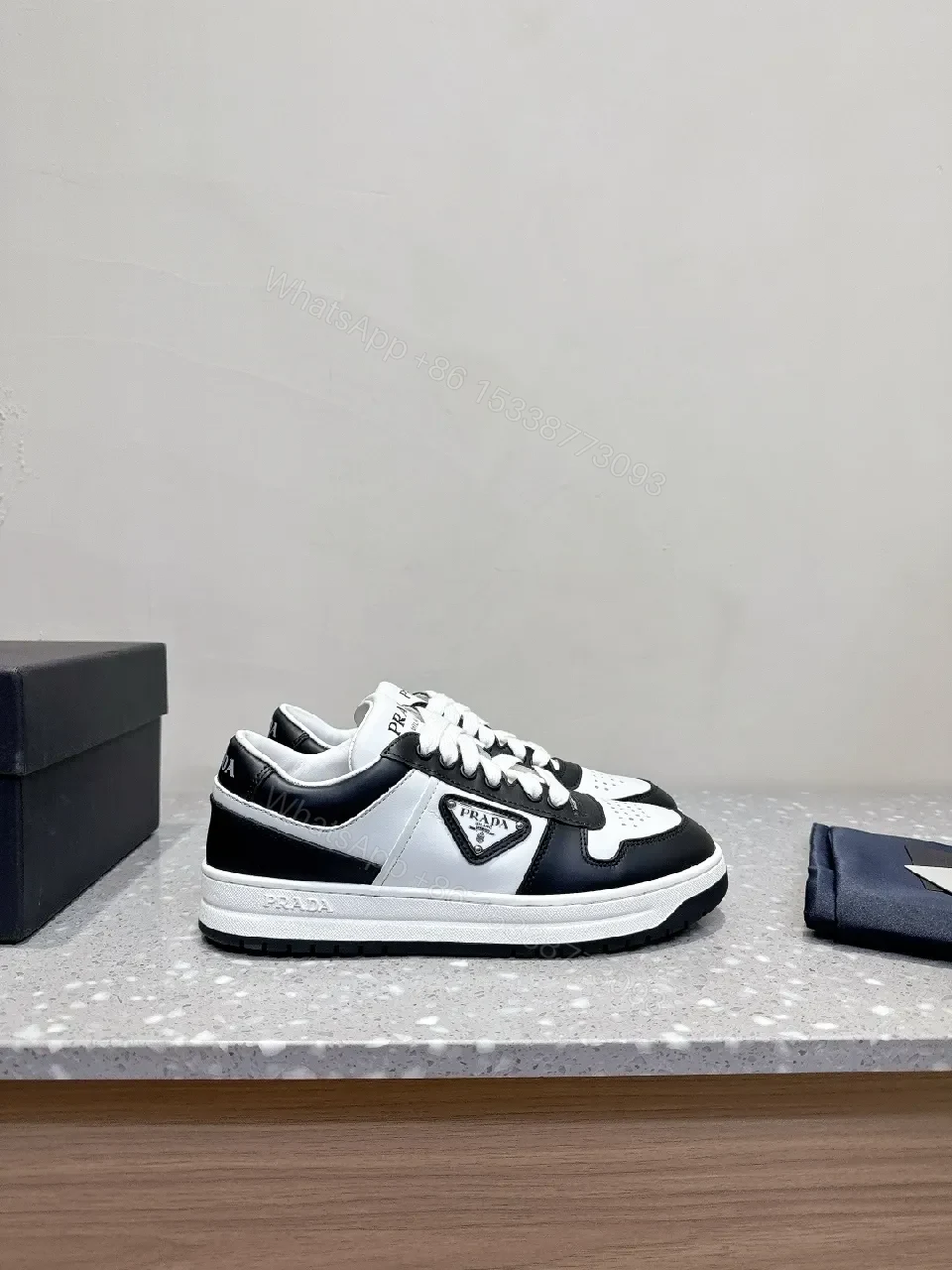 View 3 of Monochrome Leather Sneaker with Subtle Designer Detailing
