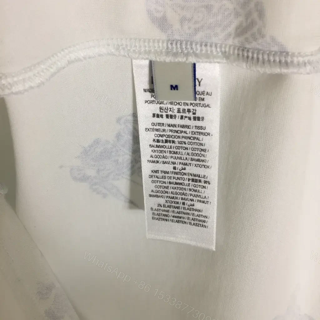 View 4 of White Burberry-Print Tee with Blue Motifs