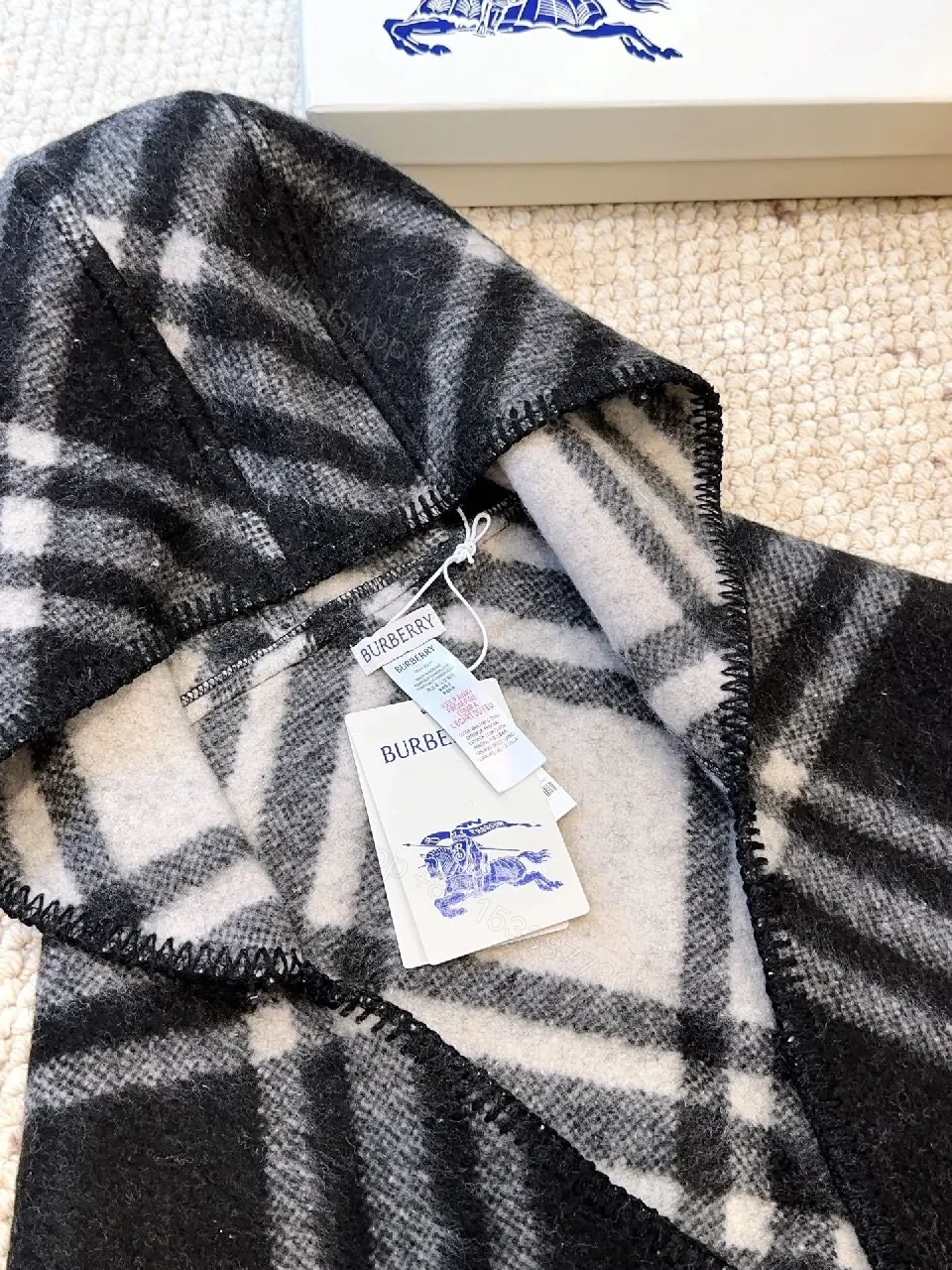 View 4 of Patterned Wool Hoodie Shawl: Luxe Plaid, Warmth & Zippered Edge