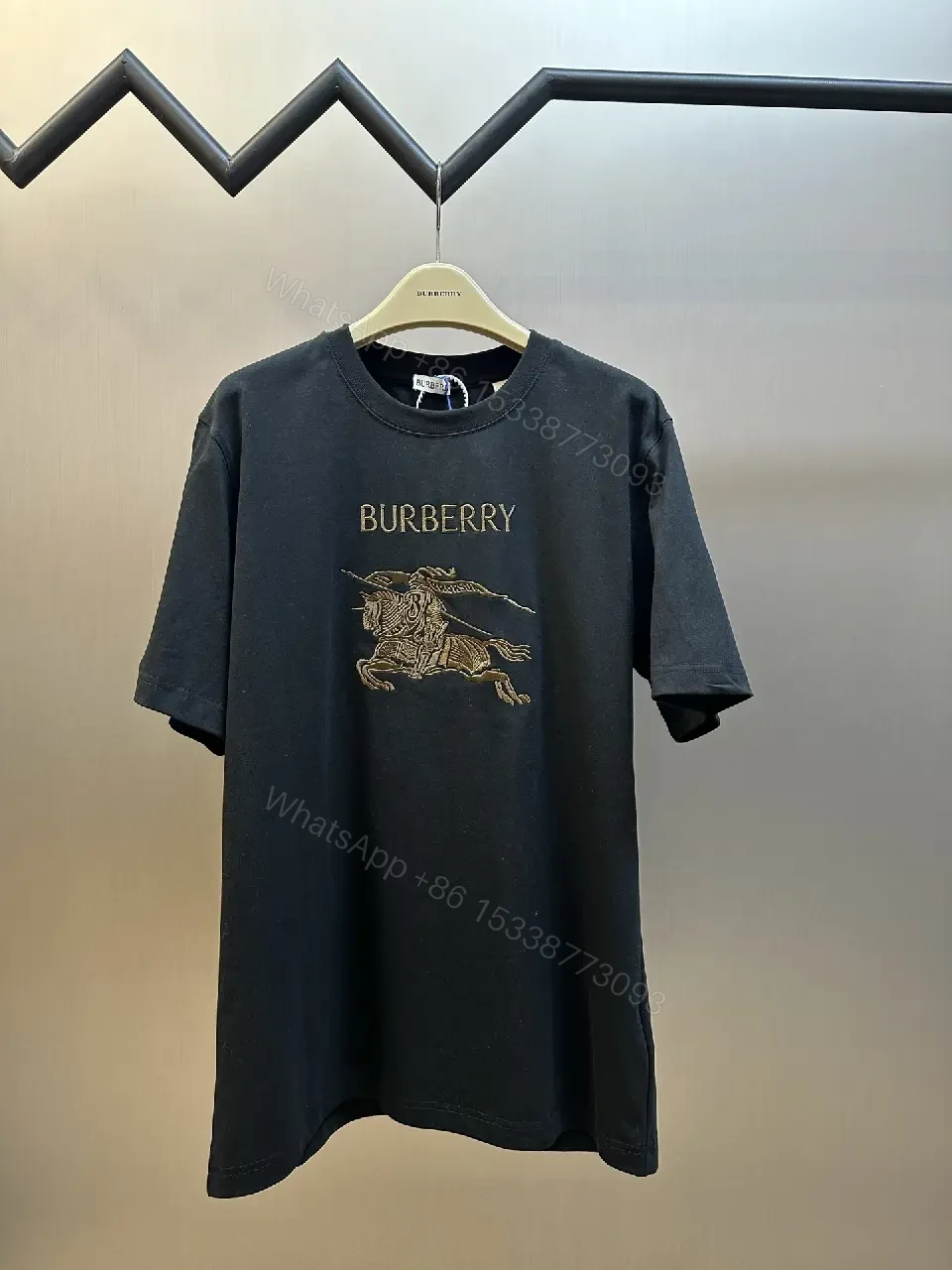 View 6 of Oversized Black Tee with Crest – Premium Cotton, Luxe Casual Tee