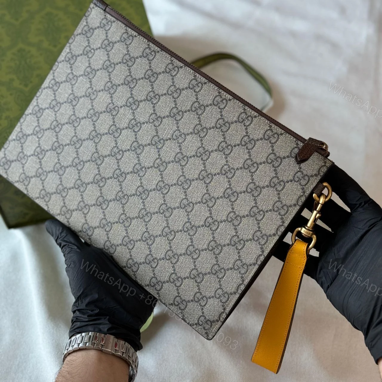 View 2 of GUCCI WEB WRISTLET SUPREME CLUTCH GG