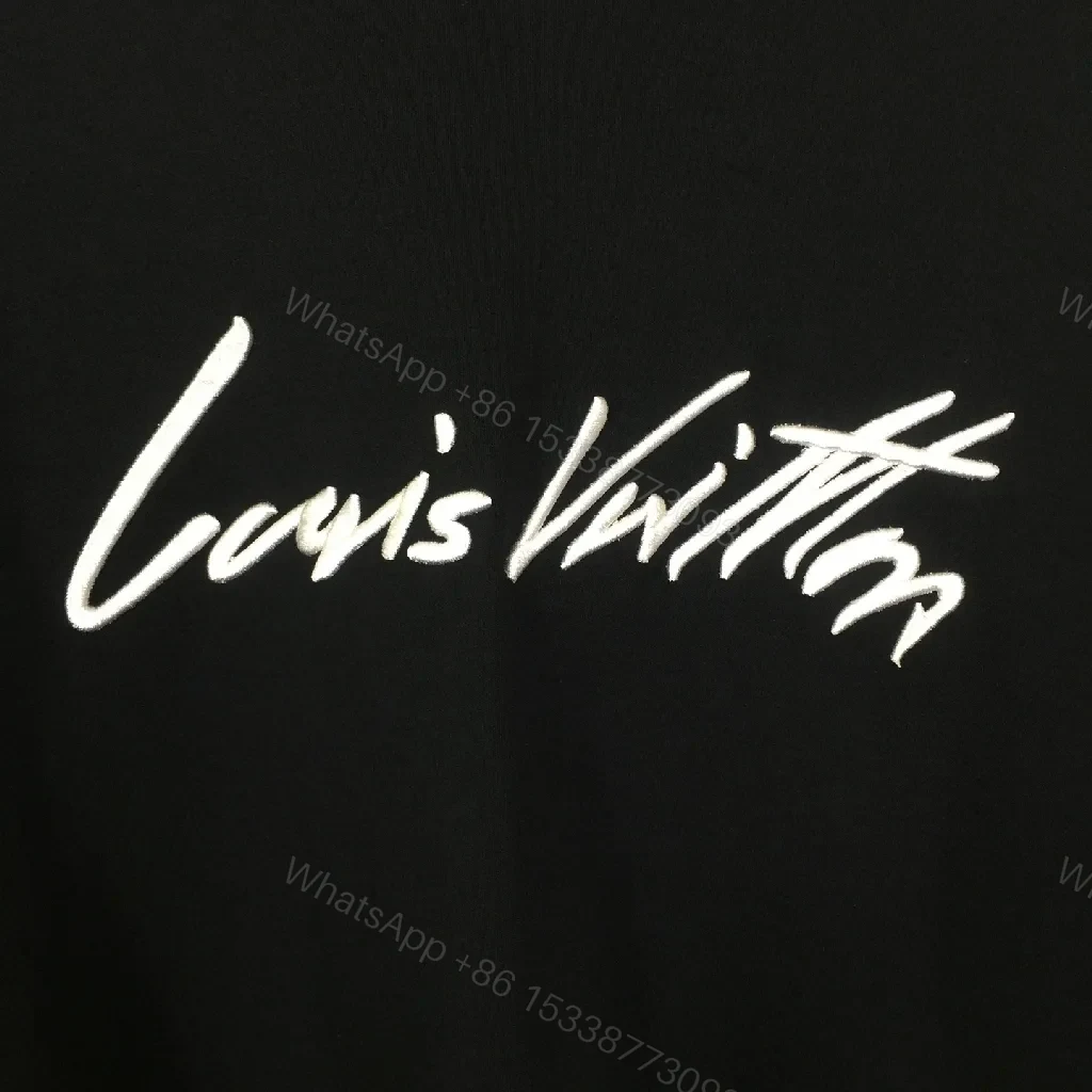 View 8 of Black Cotton Tee | Graphic Luxe Logo, Relaxed Fit, Durable