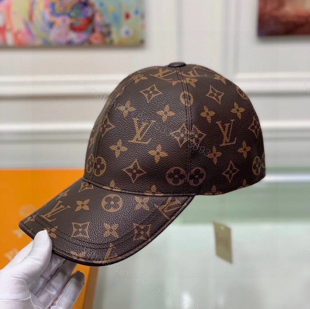View 3 of Louis Vuitton Monogram Coated Canvas Cap Brown