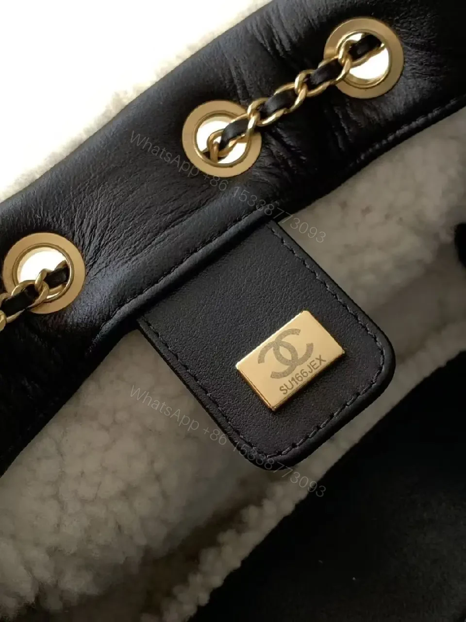 View 8 of Quilted Mini Bag with Faux Shearling Trim - Compact Luxury