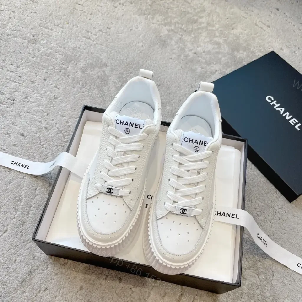 View 8 of Minimalist White Platform Sneakers with Subtle Accents