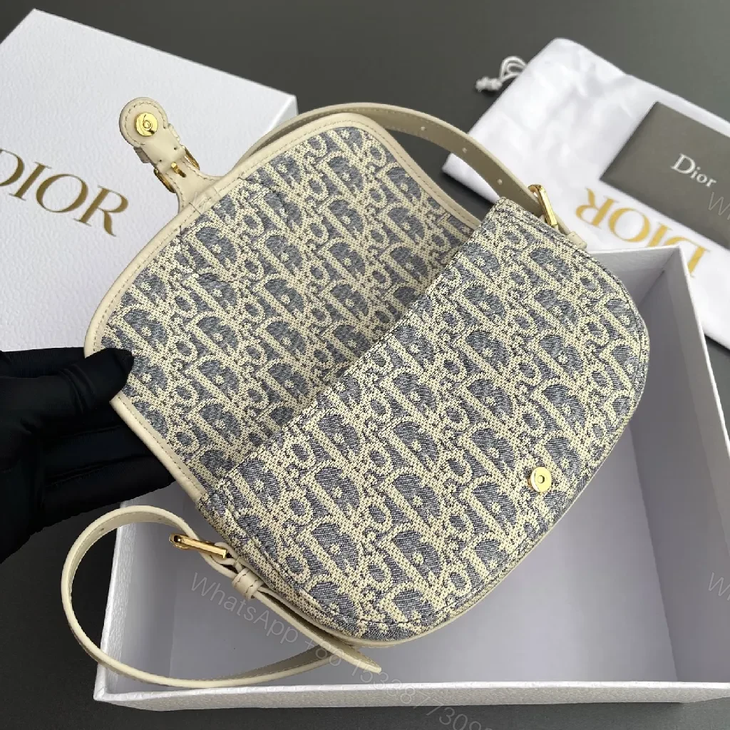 View 2 of Cream Leather-Trim Monogram Crossbody with Gold Turn-Lock, Compact Style