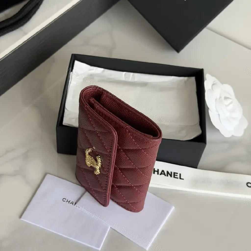 View 9 of Burgundy Quilted Leather Wallet — Gold Logo, Compact Bifold