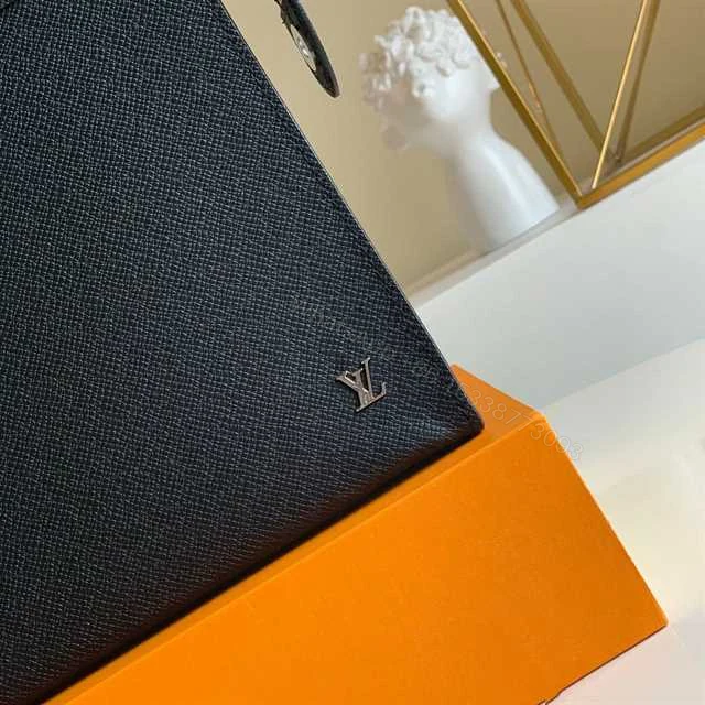View 7 of LOUIS VUITTON POCHETTE VOYAGE TAIGA LEATHER M30450