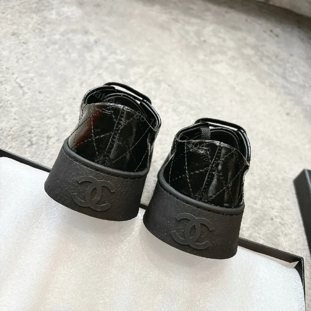 View 2 of Glossy Patent Leather Low-Tops with Gold Logo Hardware Sneakers