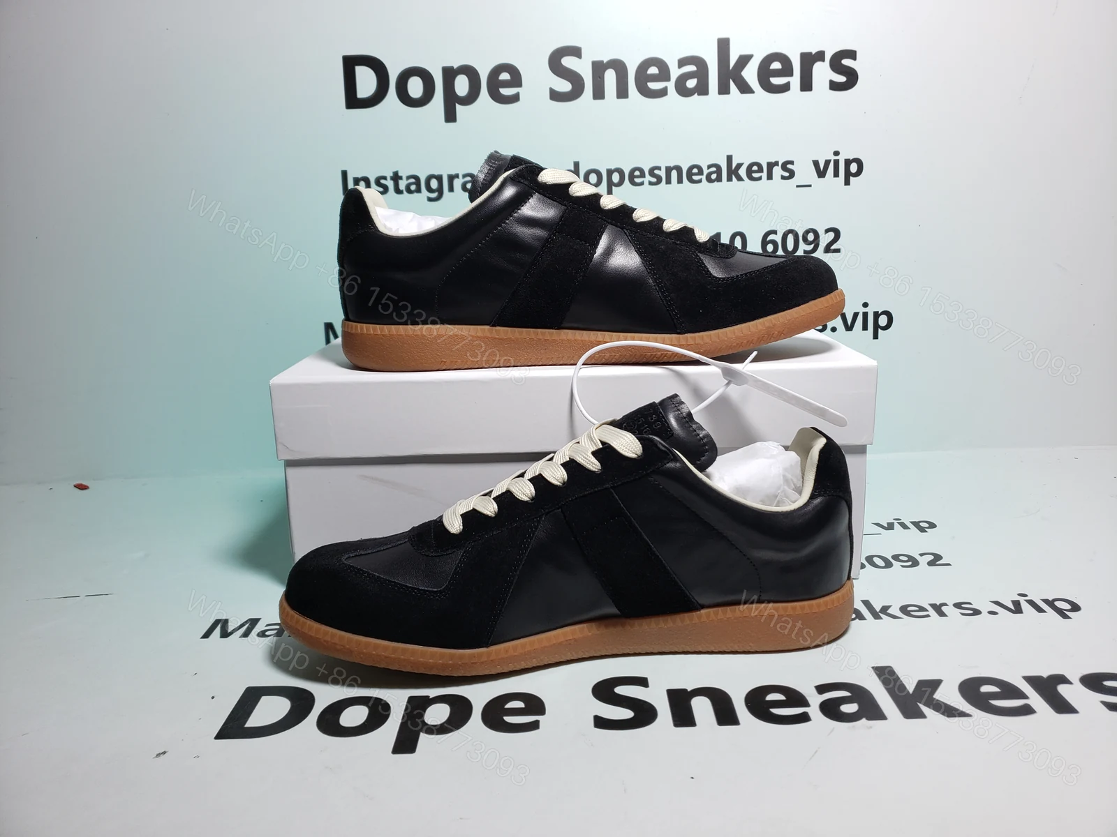 View 2 of Maison Margiela Replica low-top leather sneakers Black S57WS0236P1895
