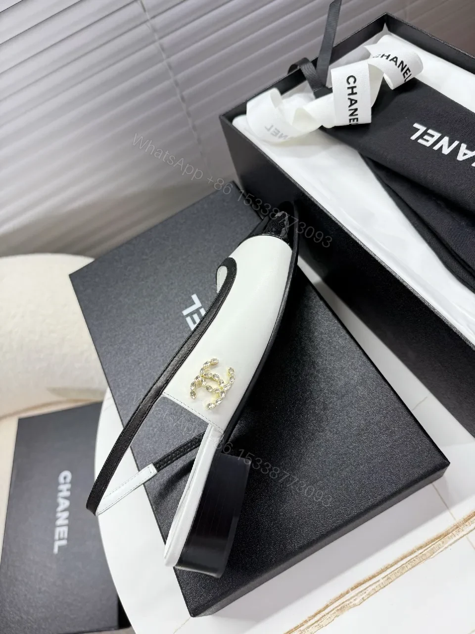 View 9 of Two-Tone Patent Slingback Pumps: Sharp Architectural Elegance