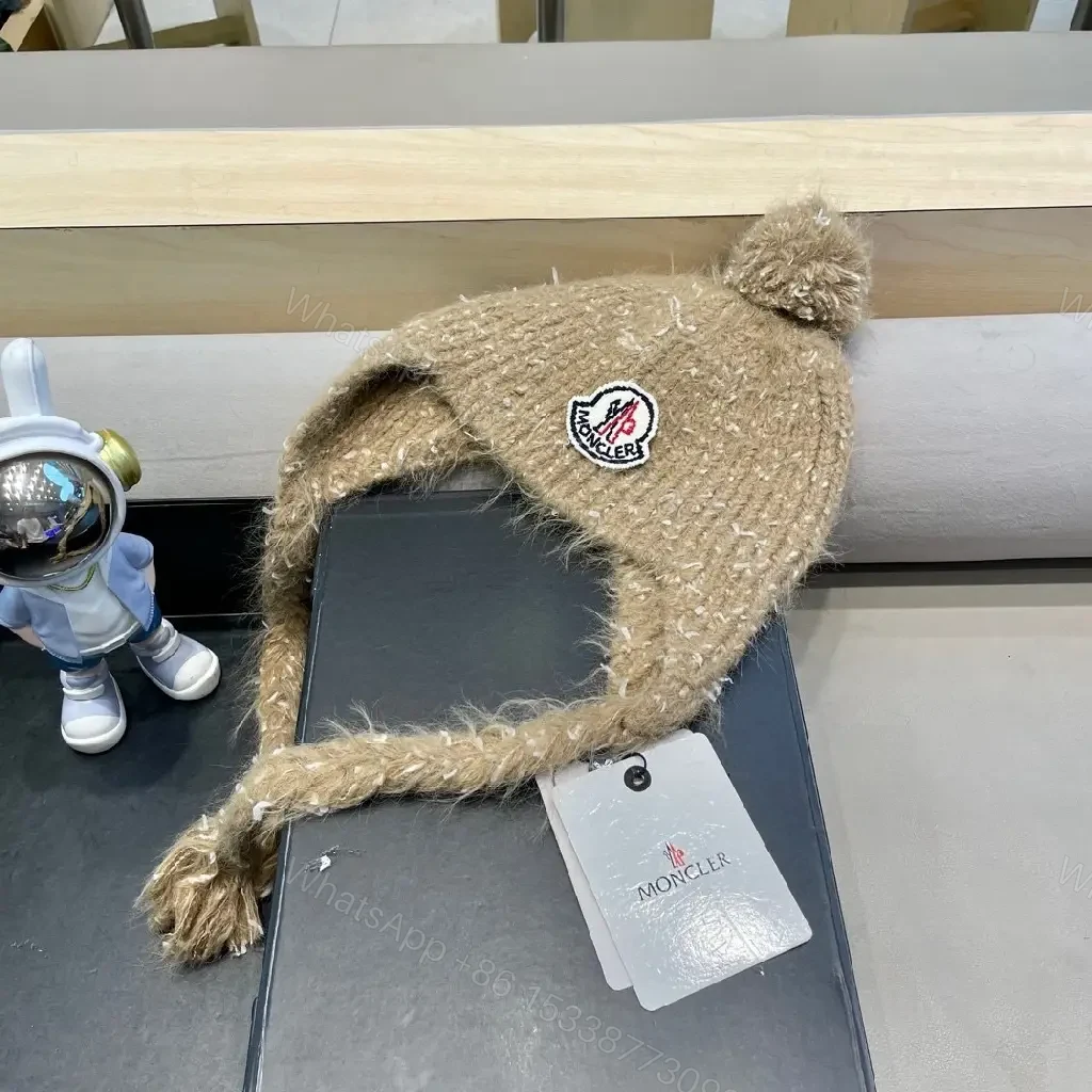 View 3 of Cozy Boucle Knit Beanie with Moncler Patch – Textured Warmth