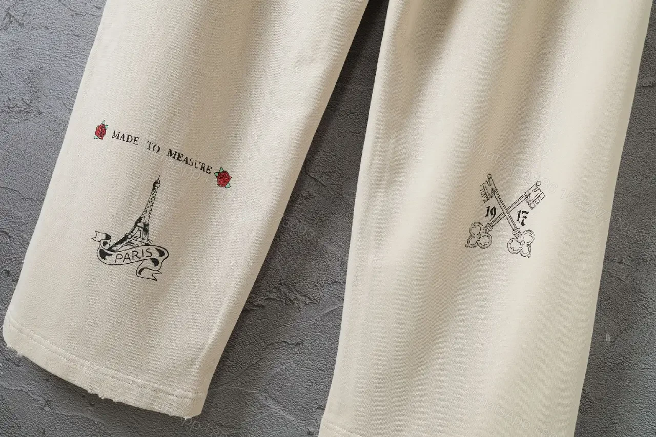 View 7 of Beige Wide-Leg Pants with Drawstring and Embroidered Patches
