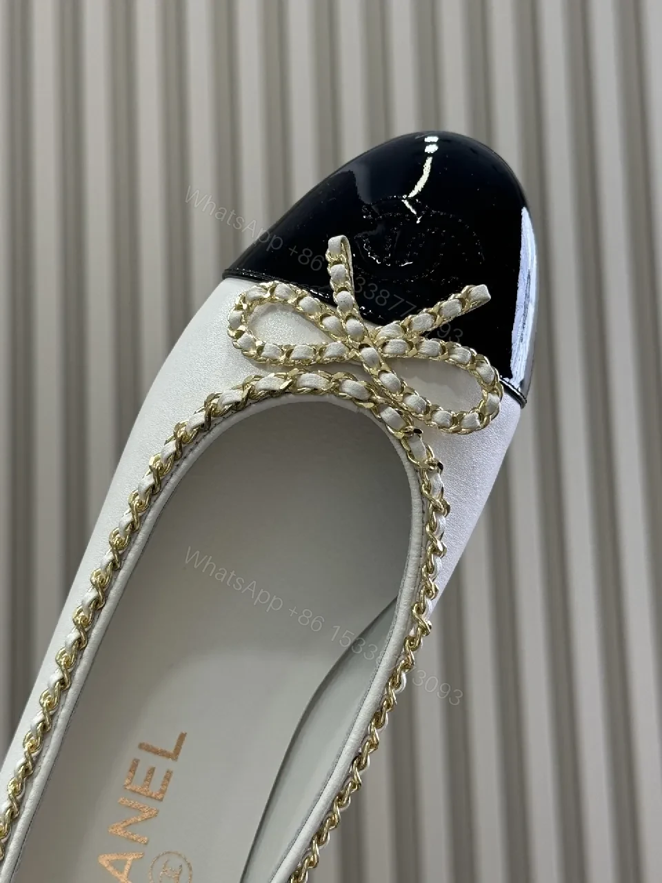 View 2 of Ivory & Black Two-Tone Ballet Flats with Gold Chain Accent