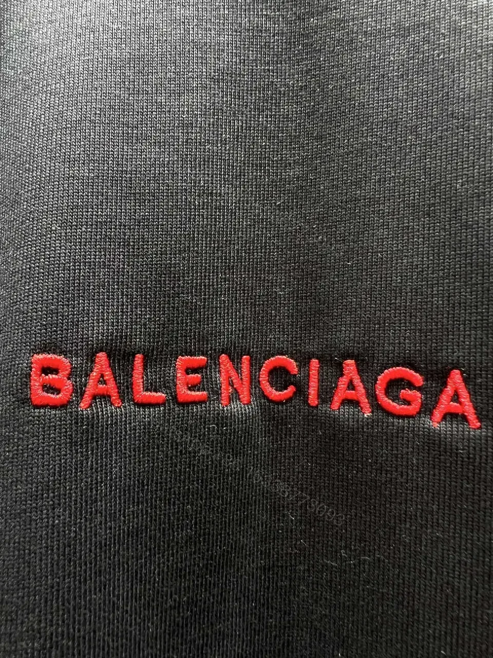 View 7 of Black Cotton Crewneck Tee with Subtle Red Logo Embroidery