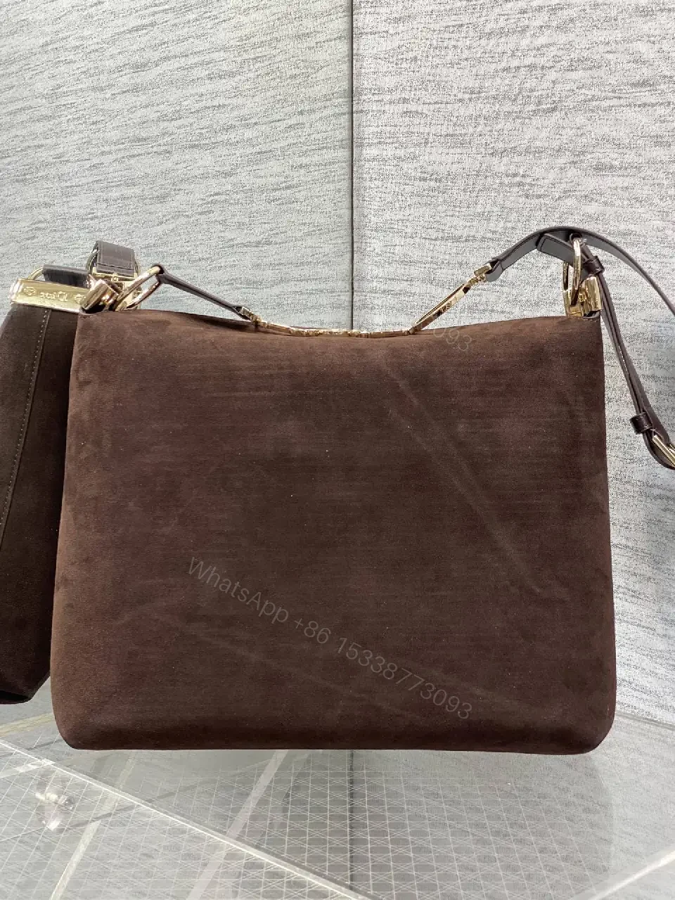 View 8 of Chic Minimalist Crossbody in Rich Brown Suede, Gold Hardware
